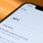 nfc iphone 11 jak włączyć